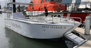 passenger transfer boat alongside dock